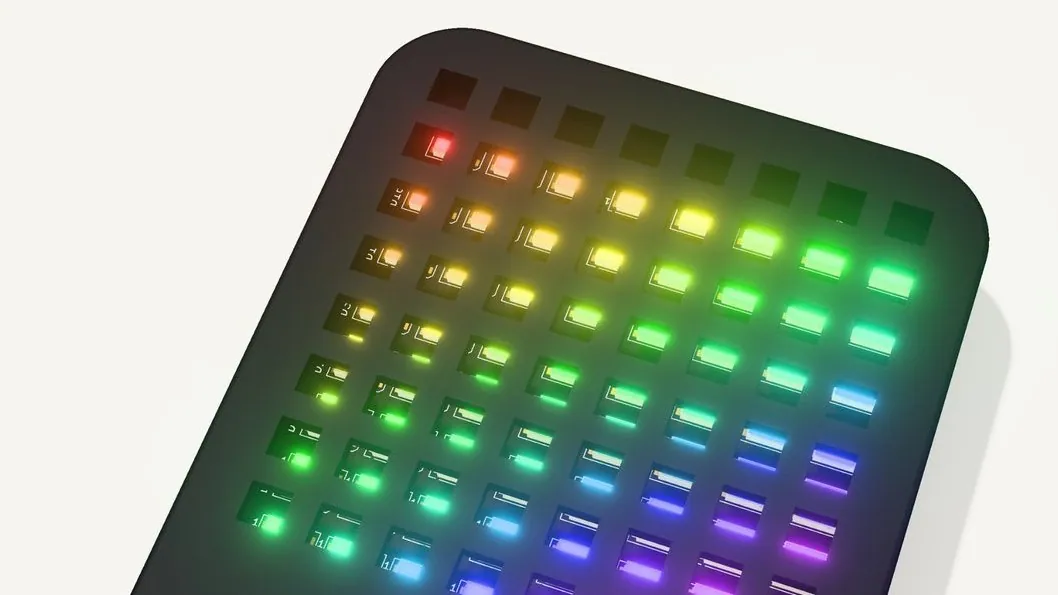 Close-up of the RGB pixel display with square LEDs glowing red, yellow, green, blue, and purple.